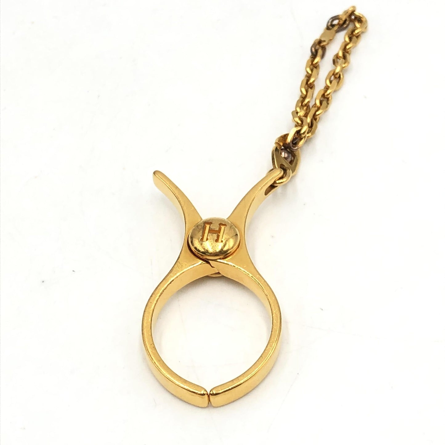 Hermès Gold Metal Glove Holder Keychain