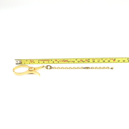 Hermès Gold Metal Glove Holder Keychain